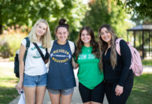 A group of freshman friends gather in the quad during common hour. Most freshman and transfers moved into their dorms on August 22