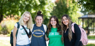 A group of freshman friends gather in the quad during common hour. Most freshman and transfers moved into their dorms on August 22